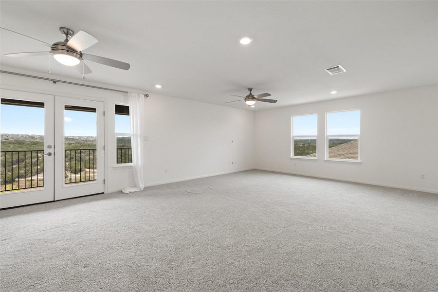 Unfurnished room with carpet, baseboards, recessed lighting, a ceiling fan, and french doors
