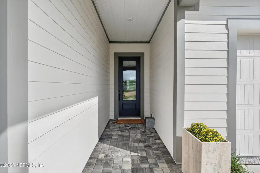 Exterior details and patio area of a home in RiverTown - WaterSong, St. Johns (Image 1).