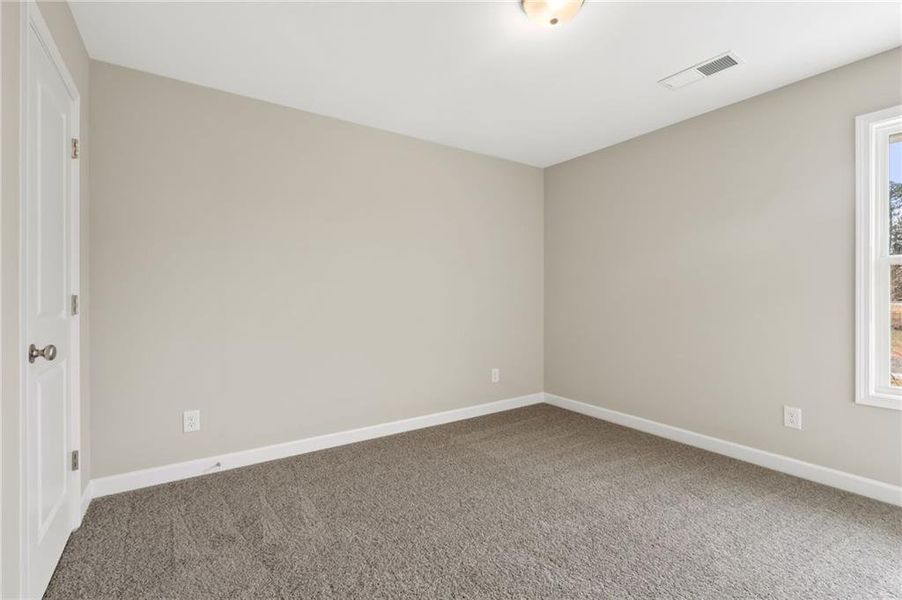 Spacious, unfurnished interior of a new home in Cherokee Township, Acworth (Image 24).