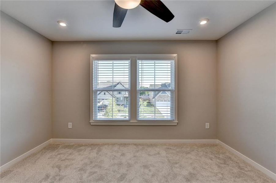 Spacious, unfurnished interior of a new home in The Reserve At Liberty Park, Braselton (Image 52).