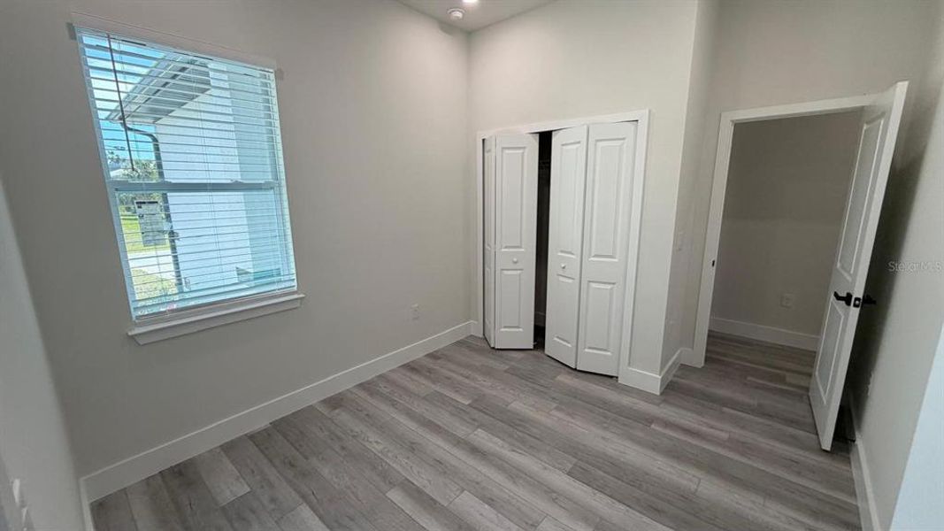 Spacious, unfurnished interior of a new home in , Port Charlotte (Image 31).