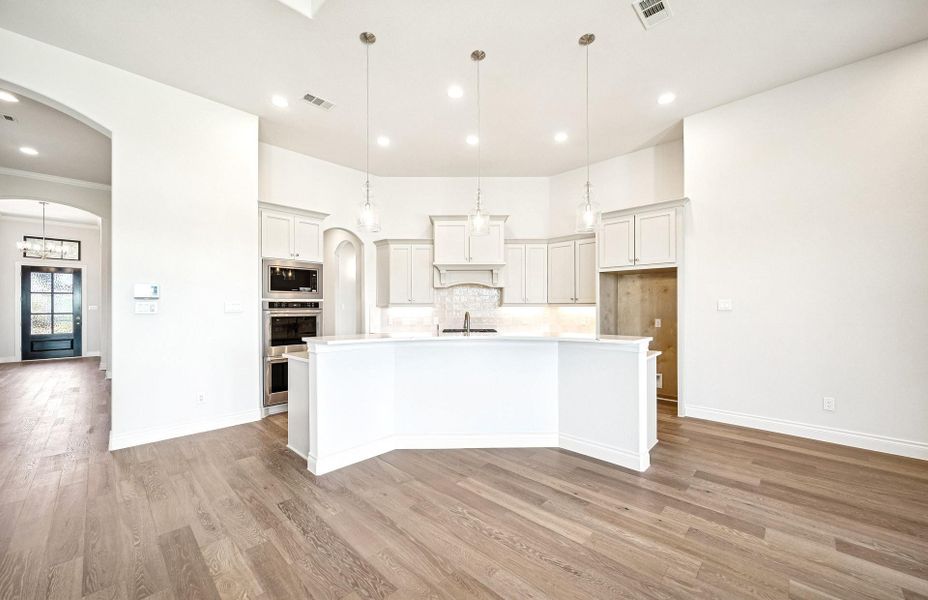Furnished interior view inside a new home in Bridgeland 60′, Cypress (Image 8).