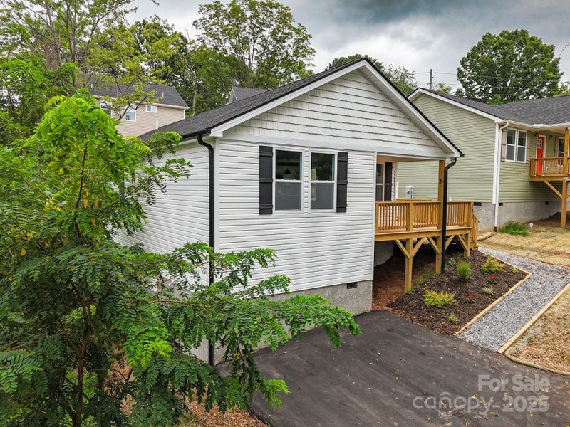 Front exterior of a new home in , Asheville, NC, highlighting curb appeal (Image 25).