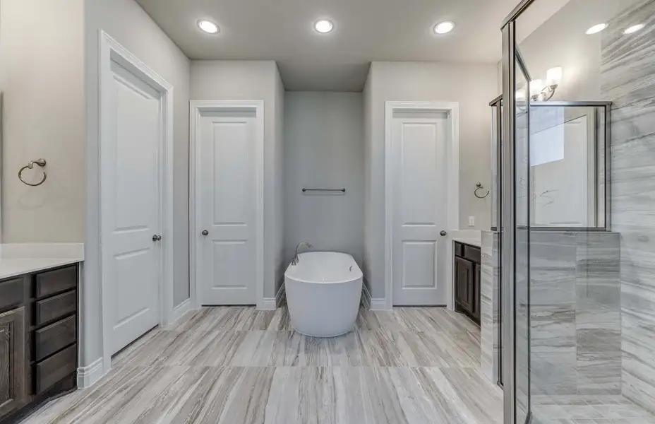Representative furnished interior of a home built from the 3798 by Ravenna Homes in The Woodlands Hills 65′, Willis (Image 17).