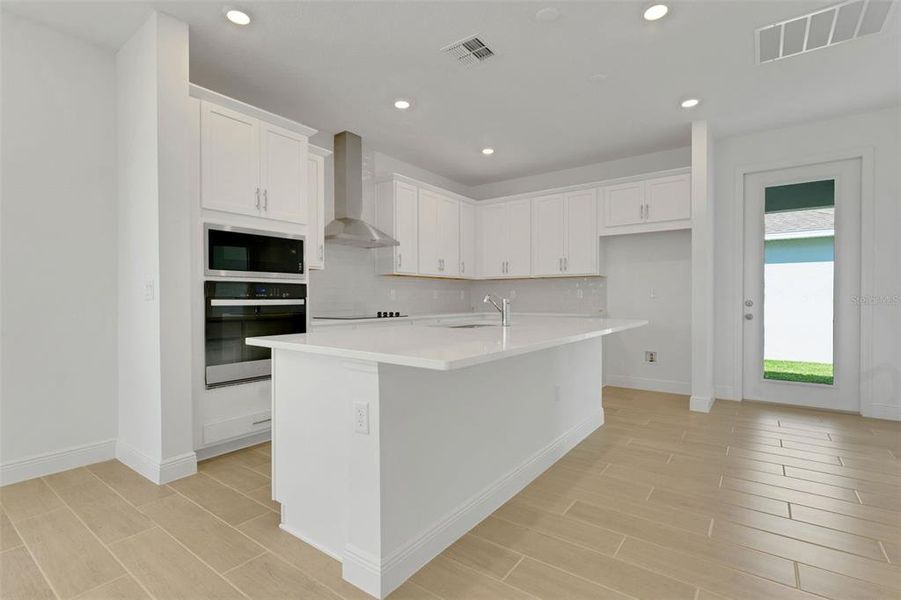 Furnished interior view inside a new home in Crossroads at Kelly Park, Apopka (Image 11).
