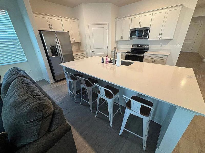Furnished interior view inside a new home in , Englewood (Image 7).