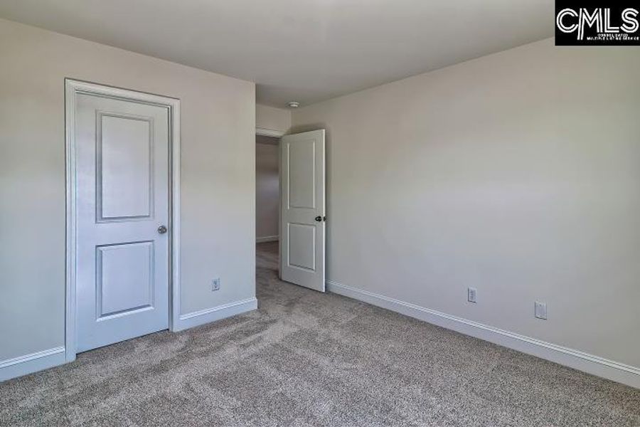 Spacious, unfurnished interior of a new home in Cottages at Roofs Pond, West Columbia (Image 42).