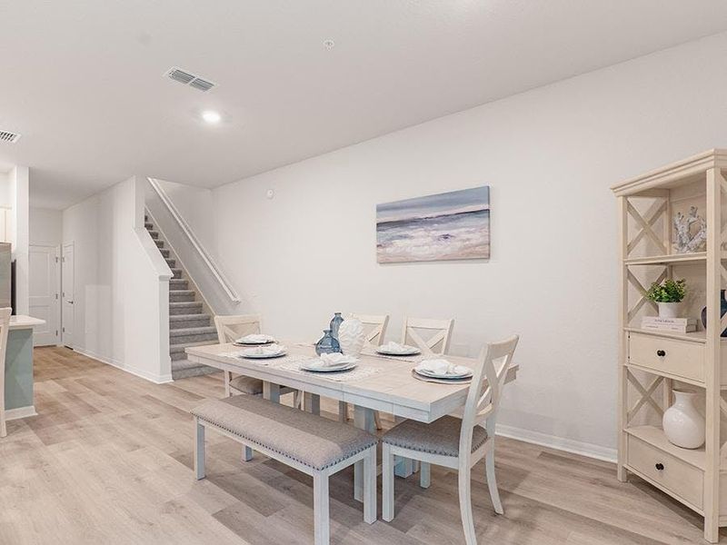 And, a dining room provides space for a table - Aspen townhome by Highland Homes And, a dining room provides space for a table - Aspen townhome by Highland Homes