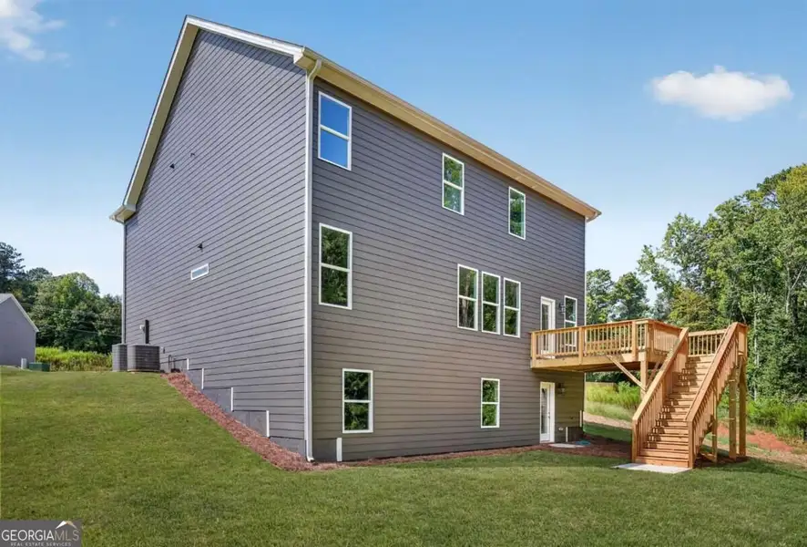 Exterior details and patio area of a home in Austin Ridge, Commerce (Image 17).