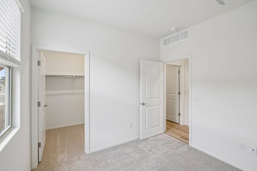 Spacious, unfurnished interior of a new home in Mirador Ridge Blossom, Tucson (Image 23).