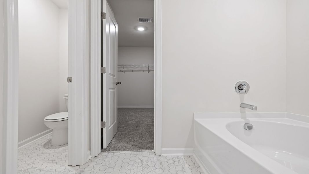 Furnished interior view inside a new home in Durbin Meadows Traditions, Fountain Inn (Image 12).