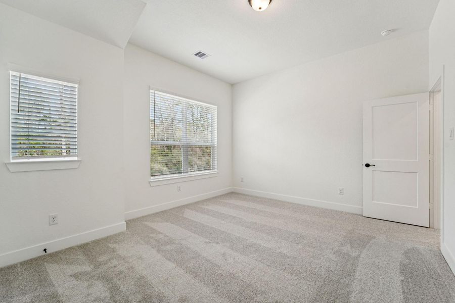 Spacious, unfurnished interior of a new home in The Woodlands Hills, Willis (Image 27).