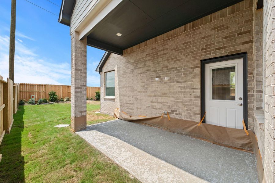 Front exterior of a new home in Jordan Ranch, Fulshear, TX, highlighting curb appeal (Image 2). Front exterior of a new home in Jordan Ranch, Fulshear, TX, highlighting curb appeal (Image 2).