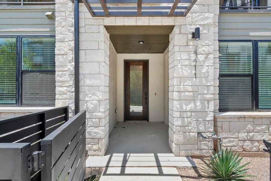 Exterior details and patio area of a home in The Grove, Austin (Image 19). Exterior details and patio area of a home in The Grove, Austin (Image 19).
