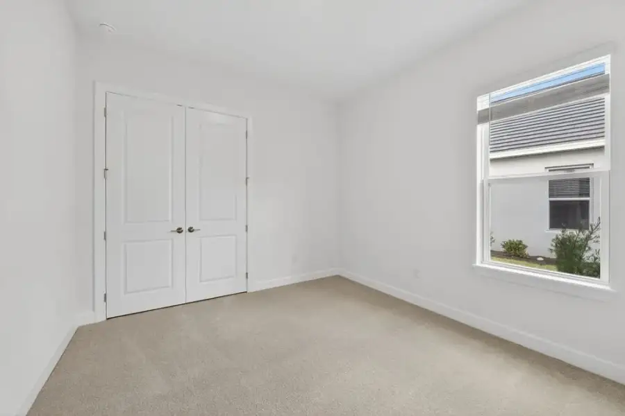 Representative unfurnished interior of a home built from the Sereno by Taylor Morrison in Esplanade at Pinewalk, St. Johns (Image 14).