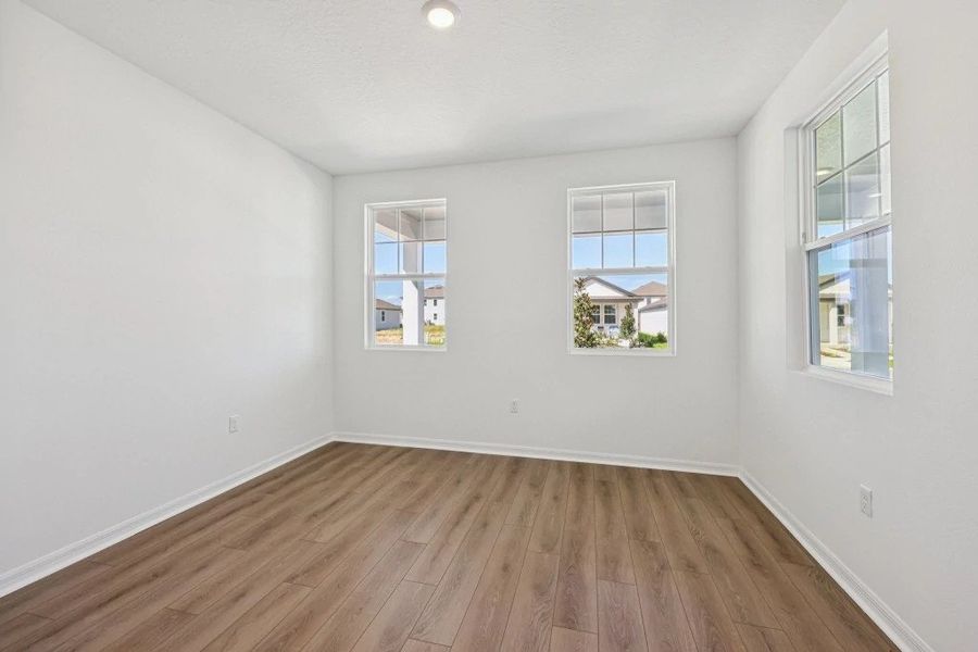Spacious, unfurnished interior of a new home in Northlake at Ovation, Winter Garden (Image 20).