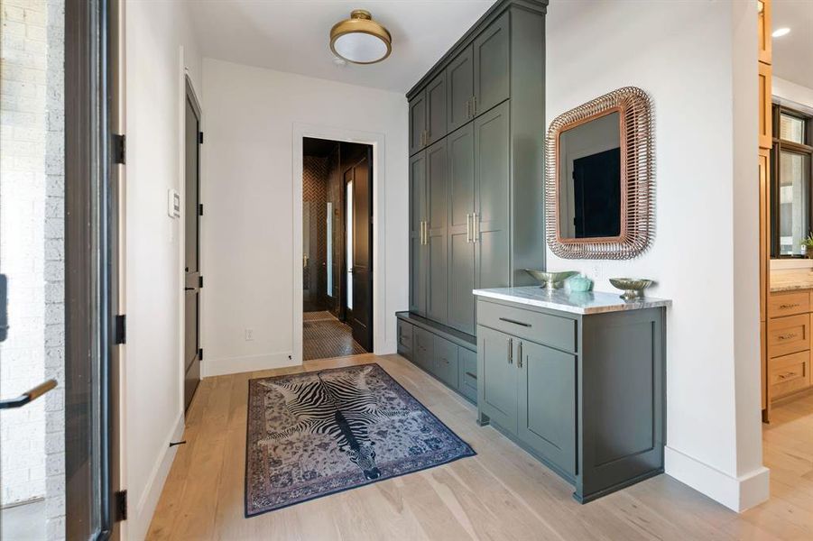 Hall featuring light wood-type flooring Hall featuring light wood-type flooring