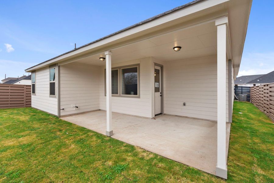 Exterior details and patio area of a home in Austin Point, Richmond (Image 4).