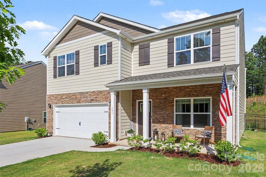 Front exterior of a new home in Lakeshore at Windstone, Mooresville, NC, highlighting curb appeal (Image 23).