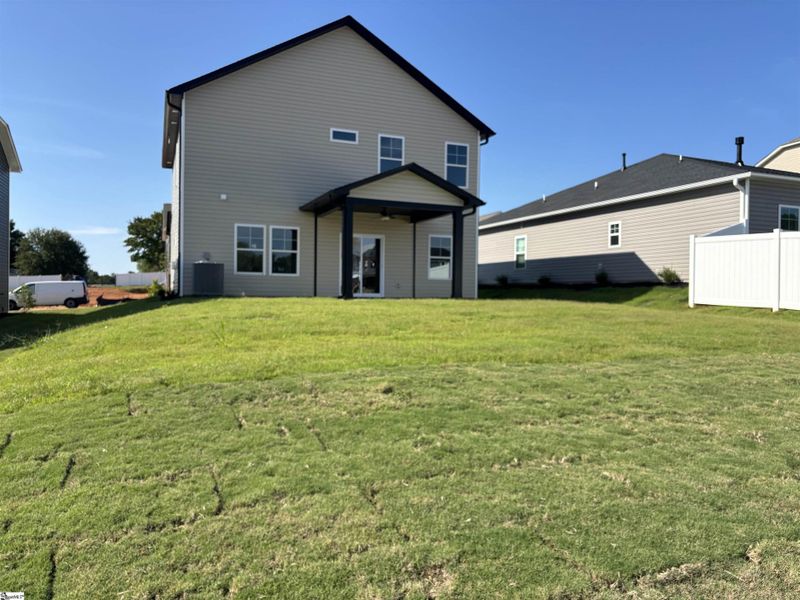Front exterior of a new home in Halton Oaks, Spartanburg, SC, highlighting curb appeal (Image 2).