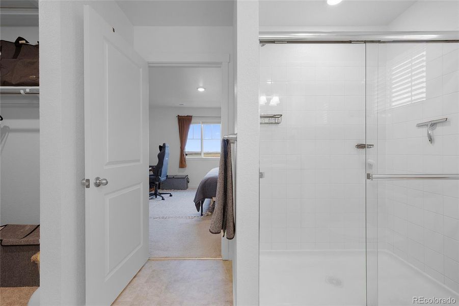 Walk in shower and spacious walk in closet.