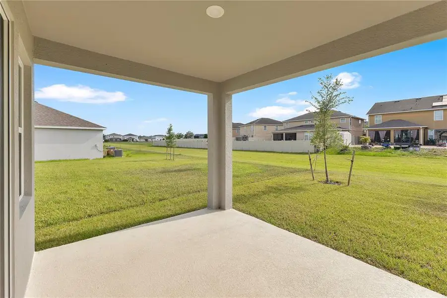 Exterior details and patio area of a home in , St. Cloud (Image 3).