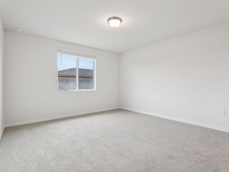 Spacious, unfurnished interior of a new home in The Grove at Stuart Crossing - Classic Series, Bartow (Image 12).