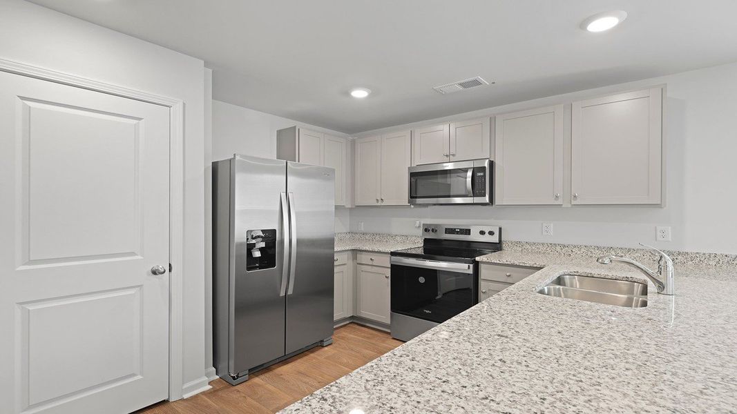 Furnished interior view inside a new home in Center Pointe, Santee (Image 13).