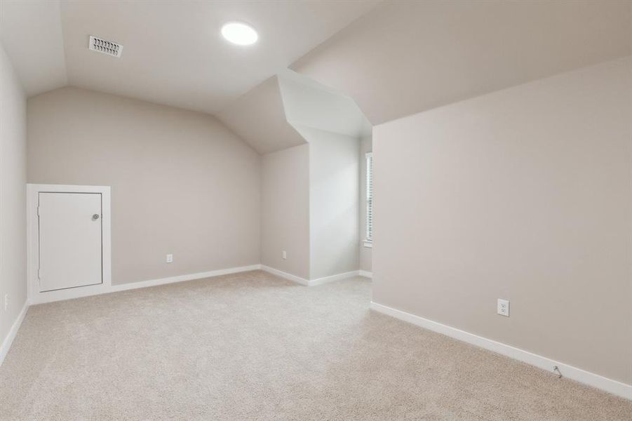 Game room in the Elm home plan by Trophy Signature Homes – REPRESENTATIVE PHOTO