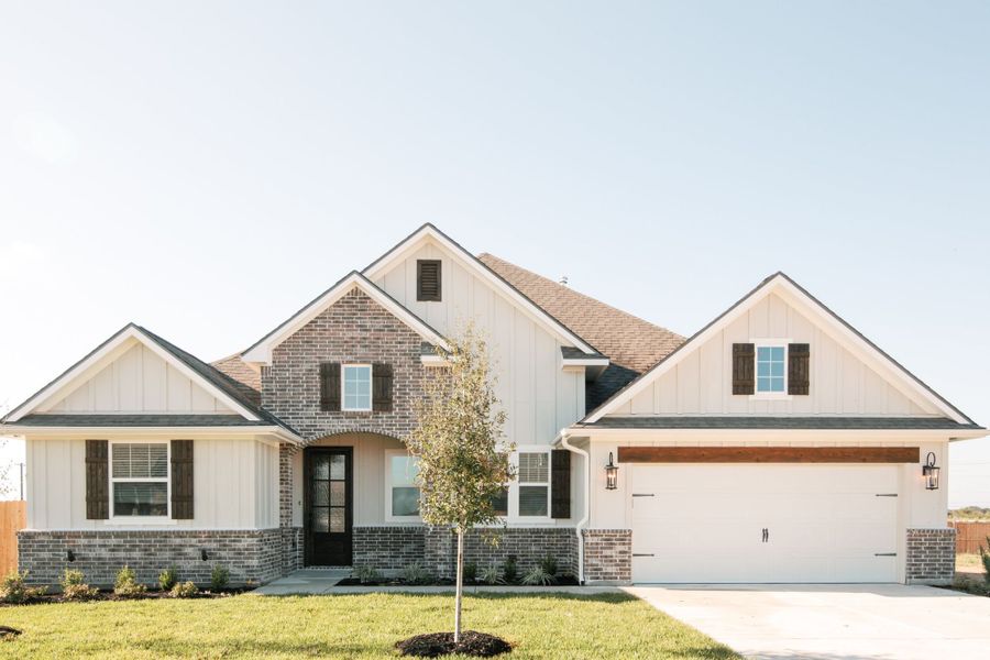 Representative exterior photo of a completed home built from the The Savannah by Reece Homes in Harvest Meadows, Bryan, TX (Image 26).