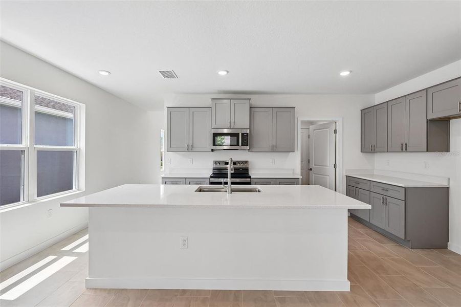 Furnished interior view inside a new home in Hamilton Bluff, Haines City (Image 9).