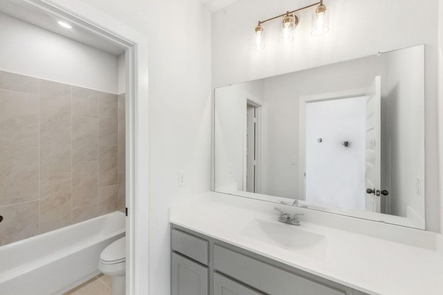 Furnished interior view inside a new home in The Colony, Bastrop (Image 8).