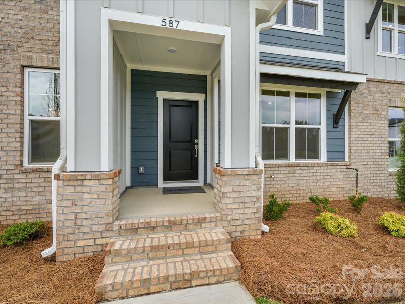 Exterior details and patio area of a home in Hardy Pond Townhomes, Rock Hill (Image 3).