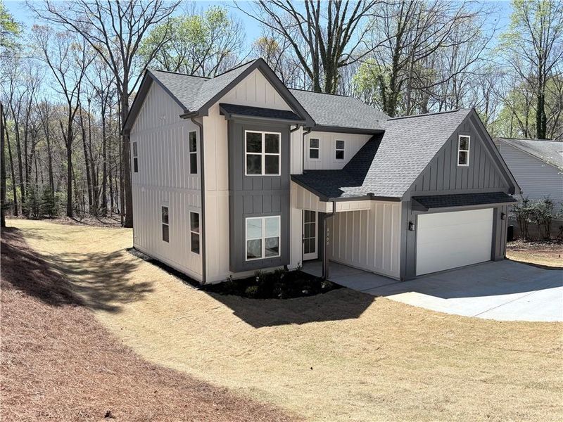 Front exterior of a new home in , Gainesville, GA, highlighting curb appeal (Image 2). Front exterior of a new home in , Gainesville, GA, highlighting curb appeal (Image 2).