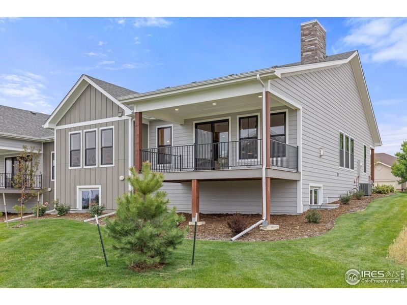 Exterior details and patio area of a home in Cottages at Kelly Farm, Greeley (Image 24).