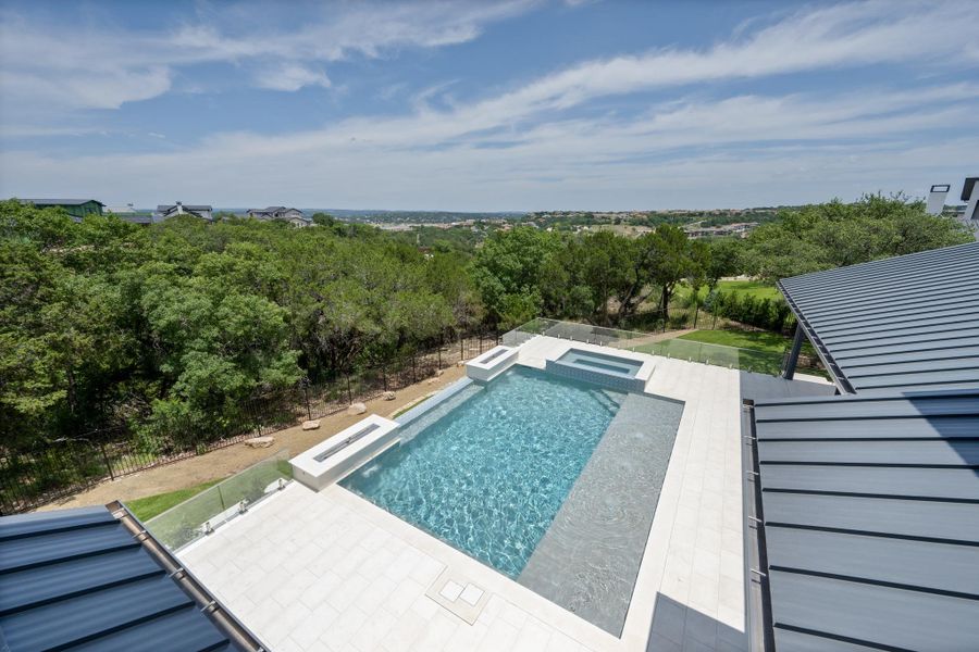 An inviting pool and spa with a scenic vista, perfect for tranquil relaxation.