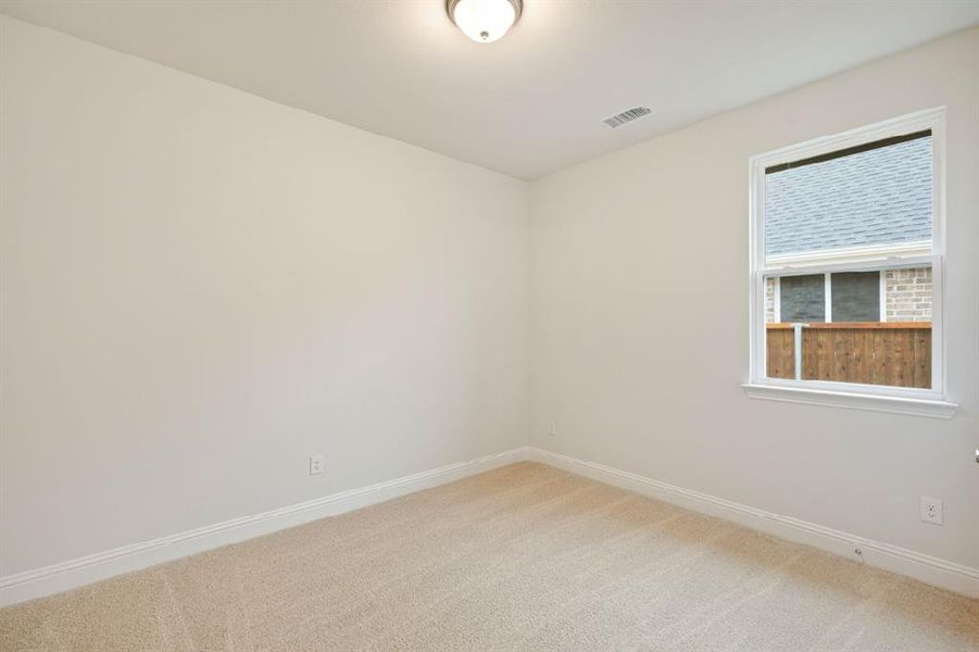 Spacious, unfurnished interior of a new home in Creekside, Royse City (Image 17).