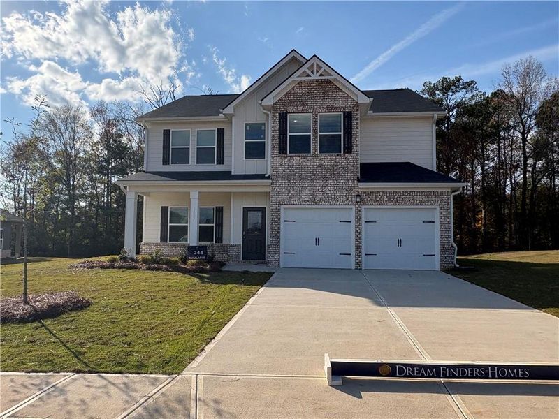 Front exterior of a new home in Southern Hills, McDonough, GA, highlighting curb appeal (Image 18).