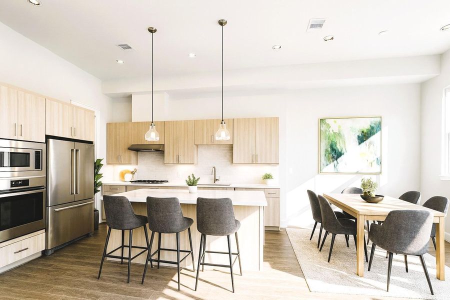 Kitchen Has Sleek European Cabinetry. Upscale Fisher Paykel Appliances (Picture was Virtually Staged - as was the Fridge ) Kitchen Has Sleek European Cabinetry. Upscale Fisher Paykel Appliances (Picture was Virtually Staged - as was the Fridge )