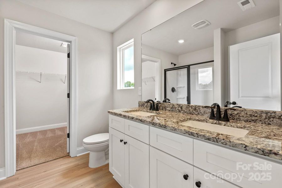Furnished interior view inside a new home in Ascot Woods, Charlotte (Image 3).