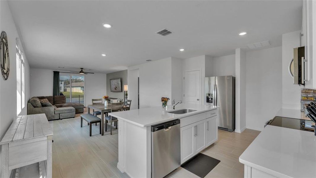 Furnished interior view inside a new home in The Grove at Stuart Crossing - Premier Series, Bartow (Image 16).