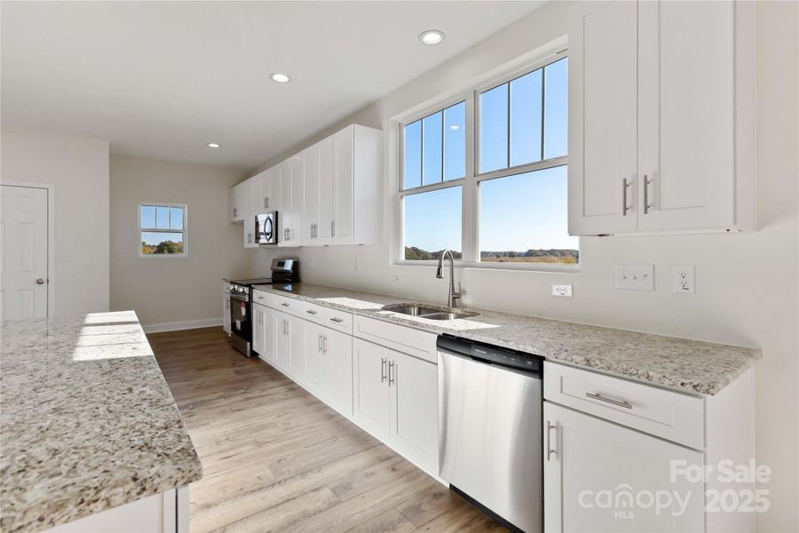 Furnished interior view inside a new home in , Monroe (Image 7). Furnished interior view inside a new home in , Monroe (Image 7).