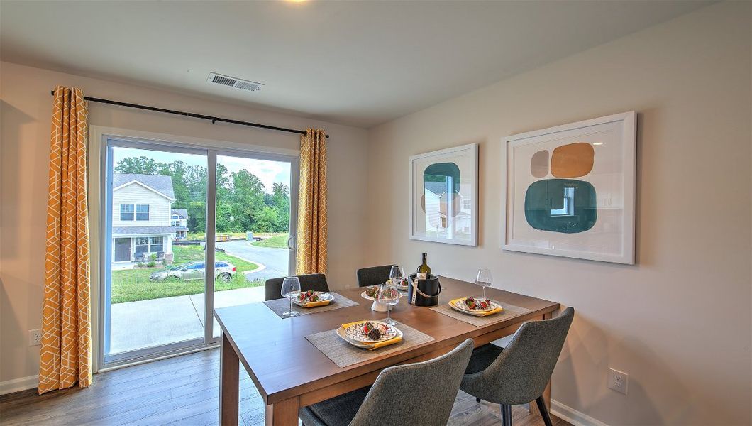 Representative furnished interior of a home built from the Clement by D.R. Horton in Virginia Commons, Arden (Image 10).