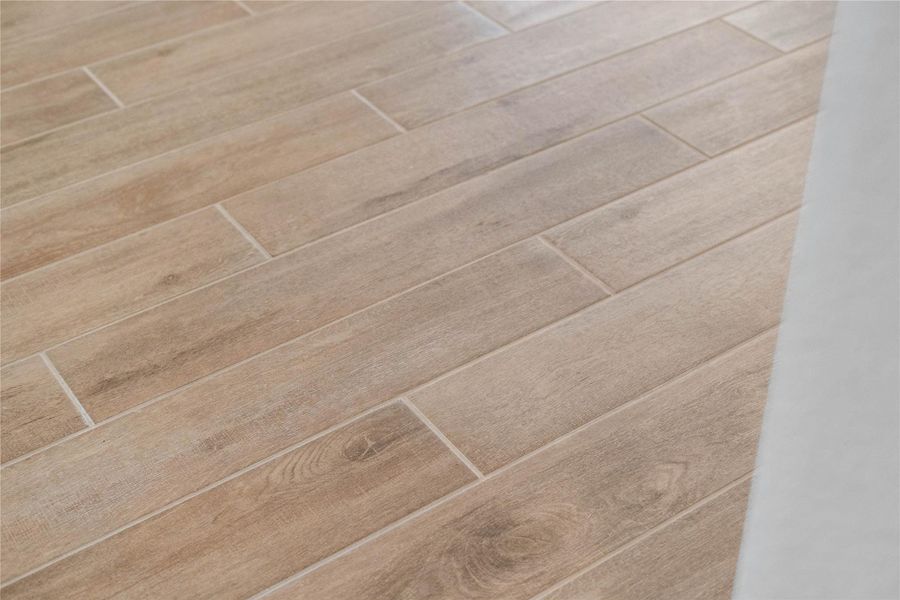 Wood-look tile flooring - Mercato Grey.