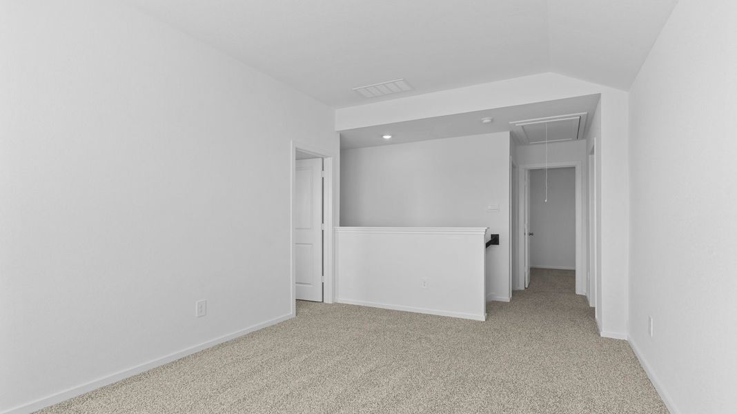 Representative unfurnished interior of a home built from the Hanna by D.R. Horton in Caldwell Crossing, Iowa Colony (Image 19).