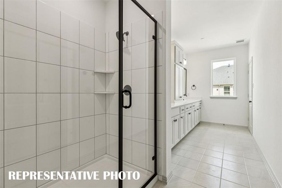 You'll never want to leave this spacious walk in shower!  REPRESENTATIVE PHOTO