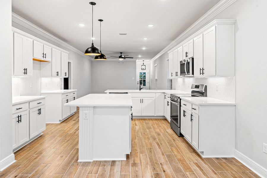 Furnished interior view inside a new home in Crescent and Symphony at Hammock Bay, Freeport (Image 5). Furnished interior view inside a new home in Crescent and Symphony at Hammock Bay, Freeport (Image 5).