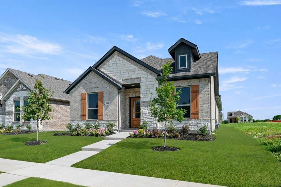Front exterior of a new home in , Midlothian, TX, highlighting curb appeal (Image 24). Front exterior of a new home in , Midlothian, TX, highlighting curb appeal (Image 24).