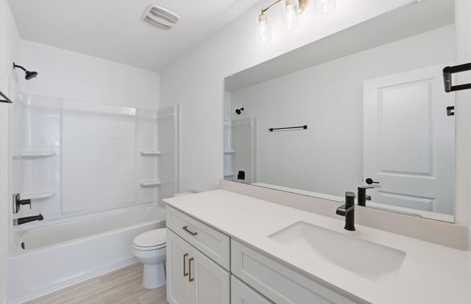 Furnished interior view inside a new home in Sunfield, Buda (Image 6). Furnished interior view inside a new home in Sunfield, Buda (Image 6).