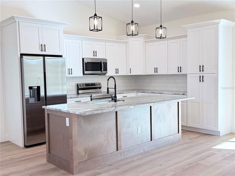 Furnished interior view inside a new home in , Port Charlotte (Image 10). Furnished interior view inside a new home in , Port Charlotte (Image 10).